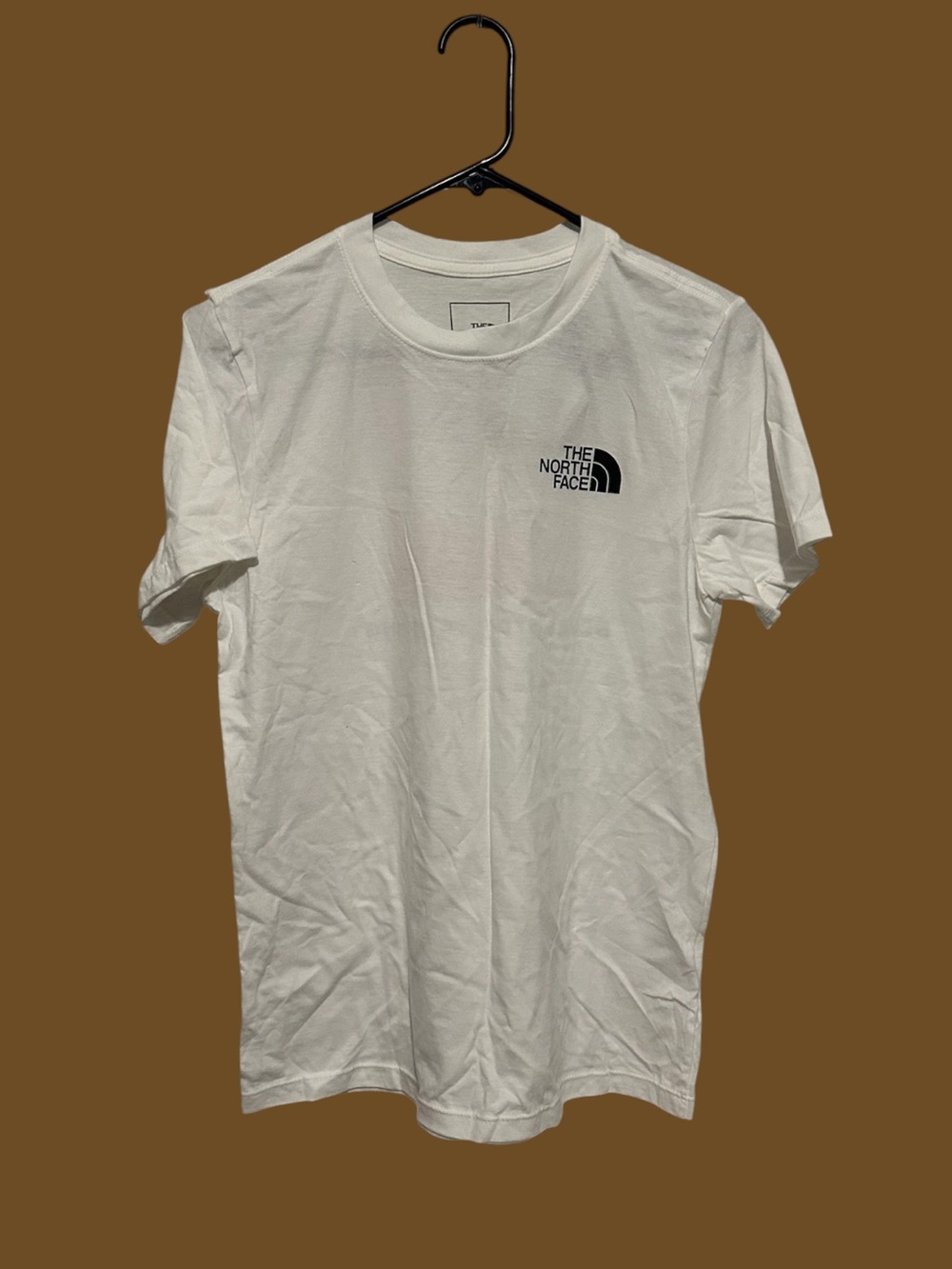 The North Face White Logo T-Shirt.